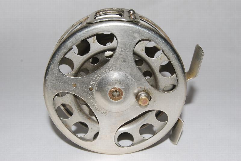 3 1/8 ROCHESTER -WOLLENSAK GERMAN SILVER 120 yd. RH/LH. 6 oz. 3 Spool  Diameter; 1 Spool width; Cap. DT-7 or WF-8 + 50 yd.. Circa 1906-1920. With  Pat. May 25, '15 Line Guide; Frame & spool of German Silver.